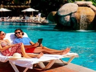 Couple at pool Free Velas All Inclusive Stays
